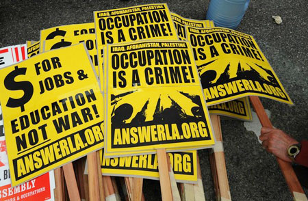 Placards used by anti-war demonstrators who staged a protest to mark the sixth anniversary of the Iraq war in Hollywood on March 21, 2009